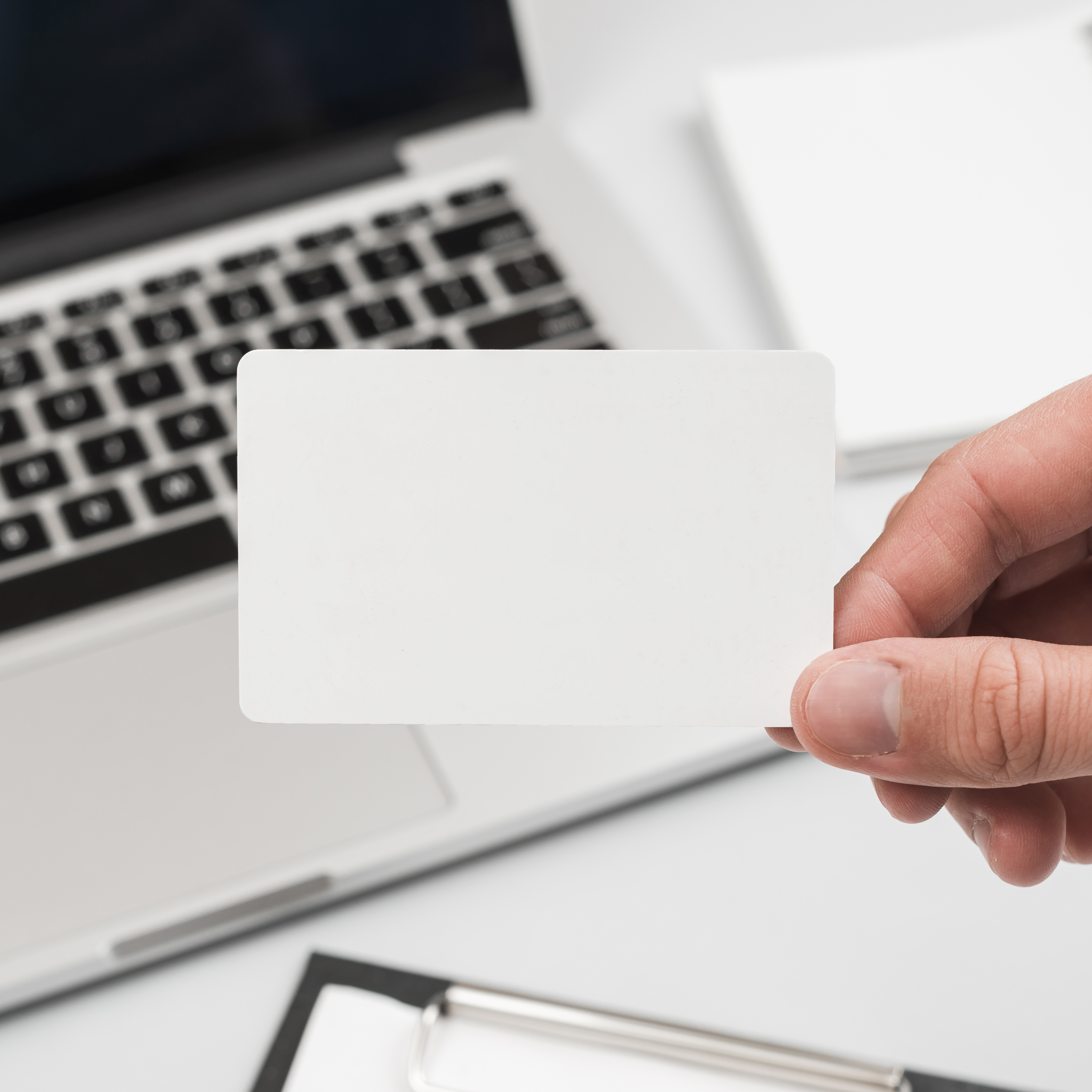 hand-holding-business-card (1).jpg